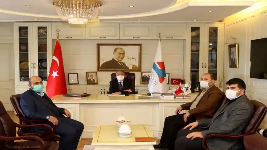 HÜDA PAR'dan yeniden AİÇÜ Rektörlüğüne atanan Karabulut'a ziyaret